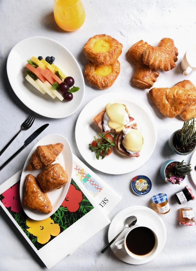 The Hari Hong Kong Hotel Exterior photo A selection of breakfast items